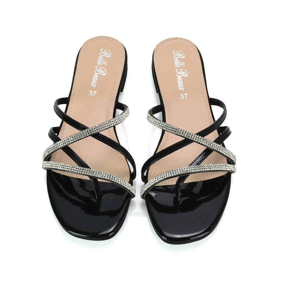 LORETTA CROSS OVER STRAPPY SLIP ON FLAT DIAMANTE SANDALS IN BLACK PATENT