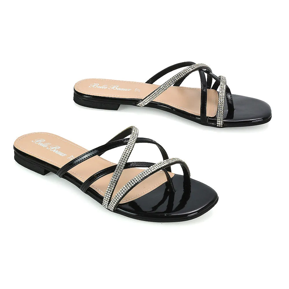 LORETTA CROSS OVER STRAPPY SLIP ON FLAT DIAMANTE SANDALS IN BLACK PATENT